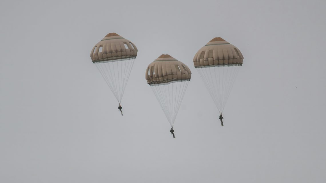 https://unsplash.com/photos/three-parachutists-descending-from-the-sky-j-FCgM674mk